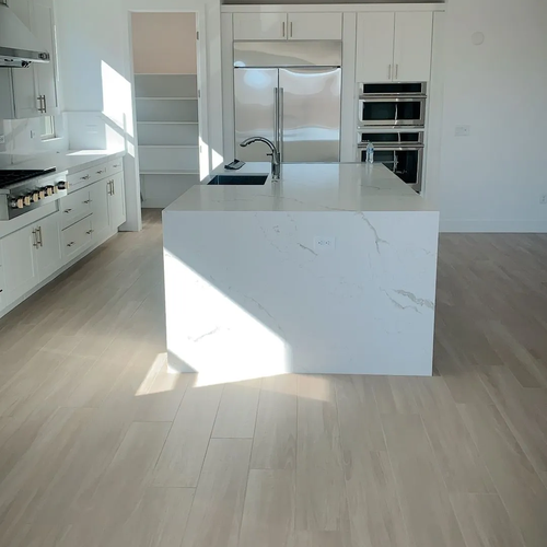 Bright modern kitchen with new LVP floors