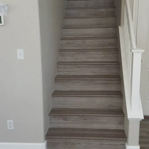Grey Vinyl flooring installed on stairs